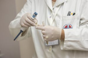 male specialist with medical tools on hands