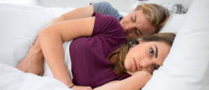 couple sleeping next to each other
