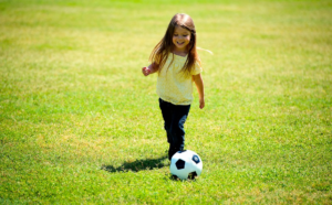 a kid with a ball
